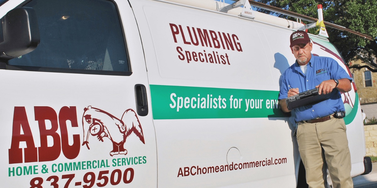 Licensed plumber creating a recommendation for water heater repair in Austin (site alt text)