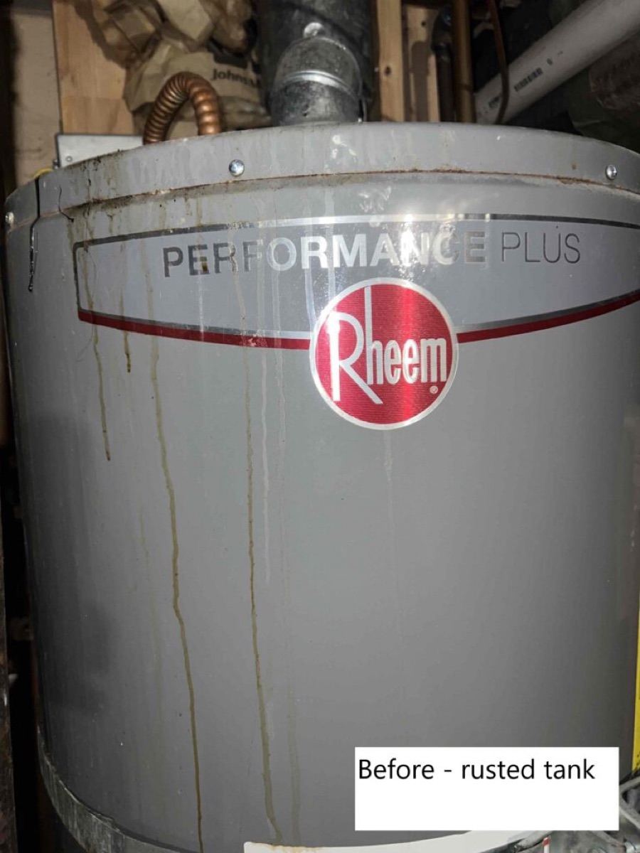 Water heater replacement by Bee's Plumbing in Bellevue, WA (before photo of rusted tank)