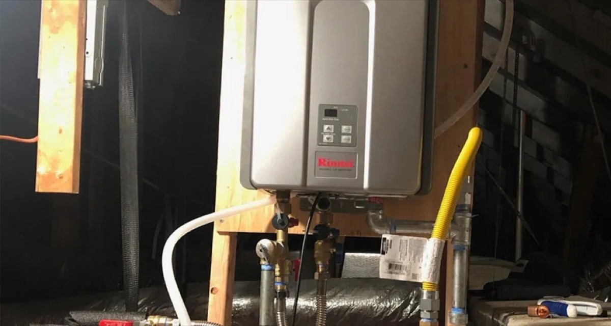 Wall-mounted tankless water heater with gas and water connections