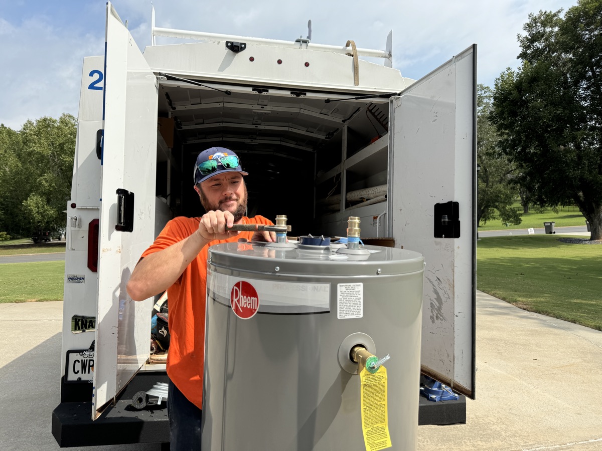 Estes plumber replacing a Rheem tank water heater