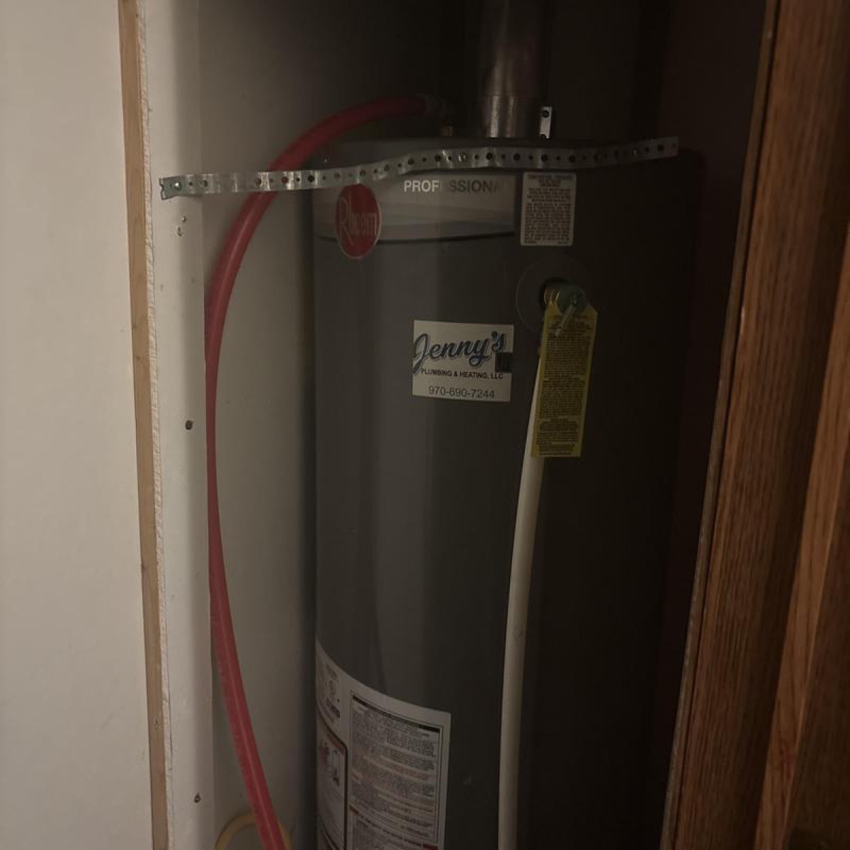 30-gallon A.O. Smith mobile-home water heater installation in a tight closet