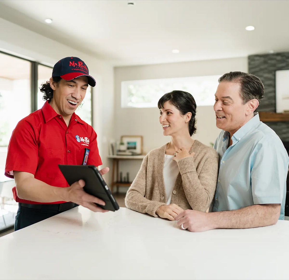 Technician explaining service to customers