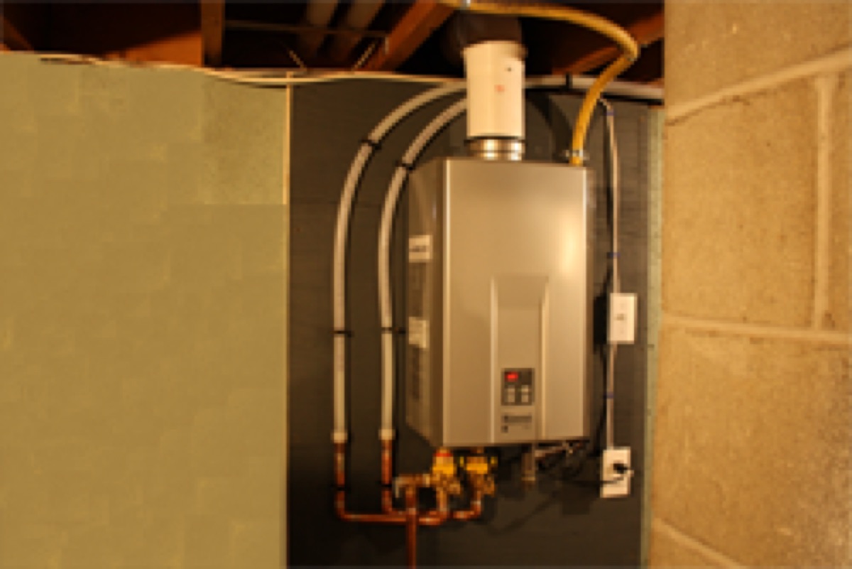 Wall-mounted Rinnai tankless water heater installation