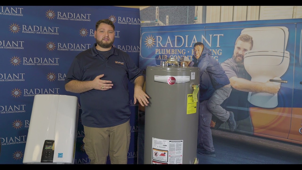 Radiant technician standing next to a tank and a tankless water heater