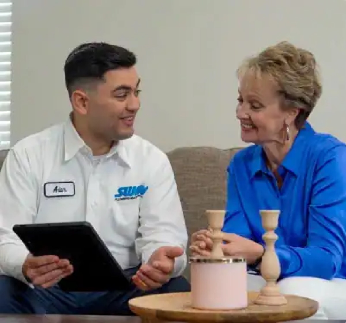 SWAN technician discussing financing with a customer