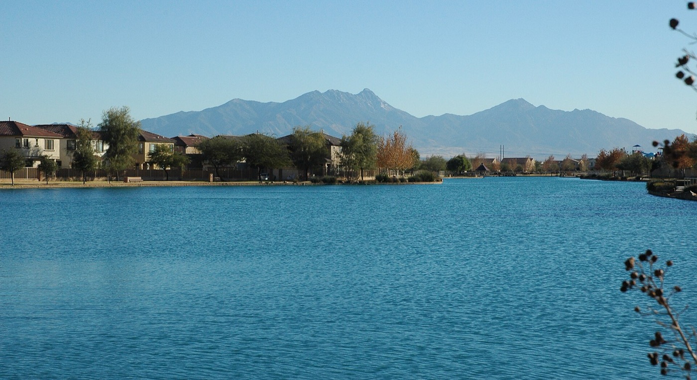 Sahuarita Lake seen from its northern edge in winter, with desert hills beyond