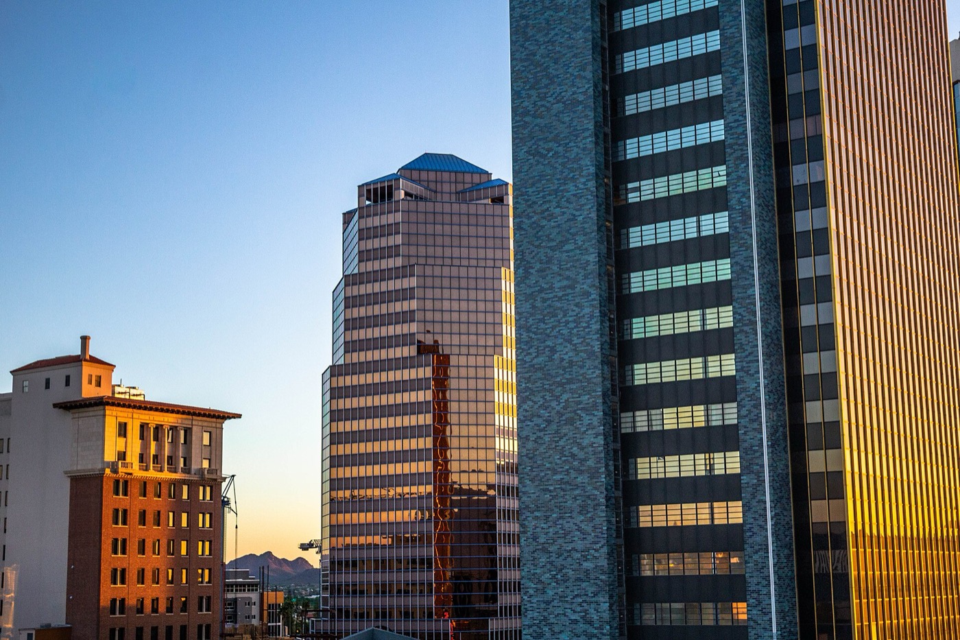 Downtown Tucson office towers lit by the setting sun, May 2019