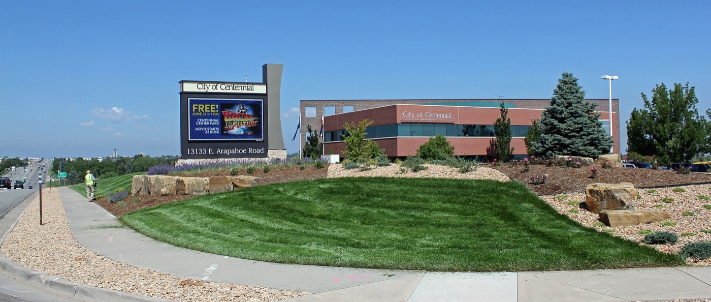 Landscaped entrance and sign of the Centennial Civic Center on East Arapahoe Road