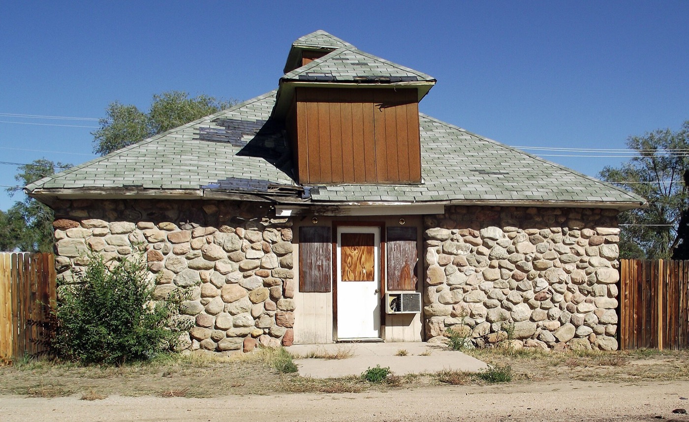 Front of the historic Old Livery Stable building in Fountain, Colorado