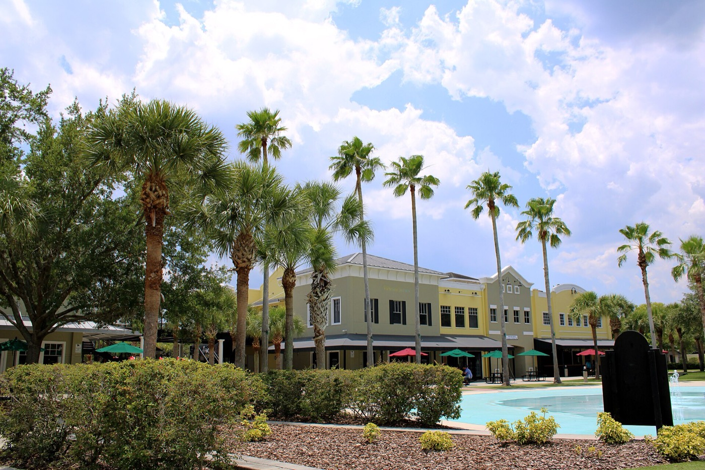 Shops and buildings around the Park Square plaza in FishHawk Ranch on a cloudy day