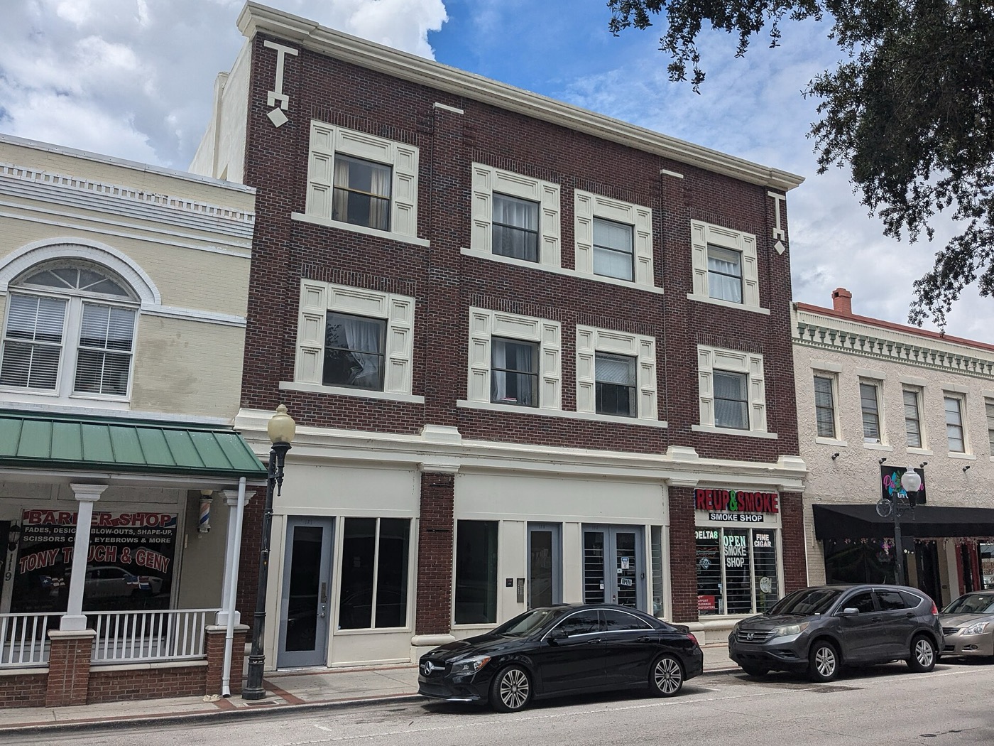 Three-story brick commercial building on Broadway Avenue in downtown Kissimmee