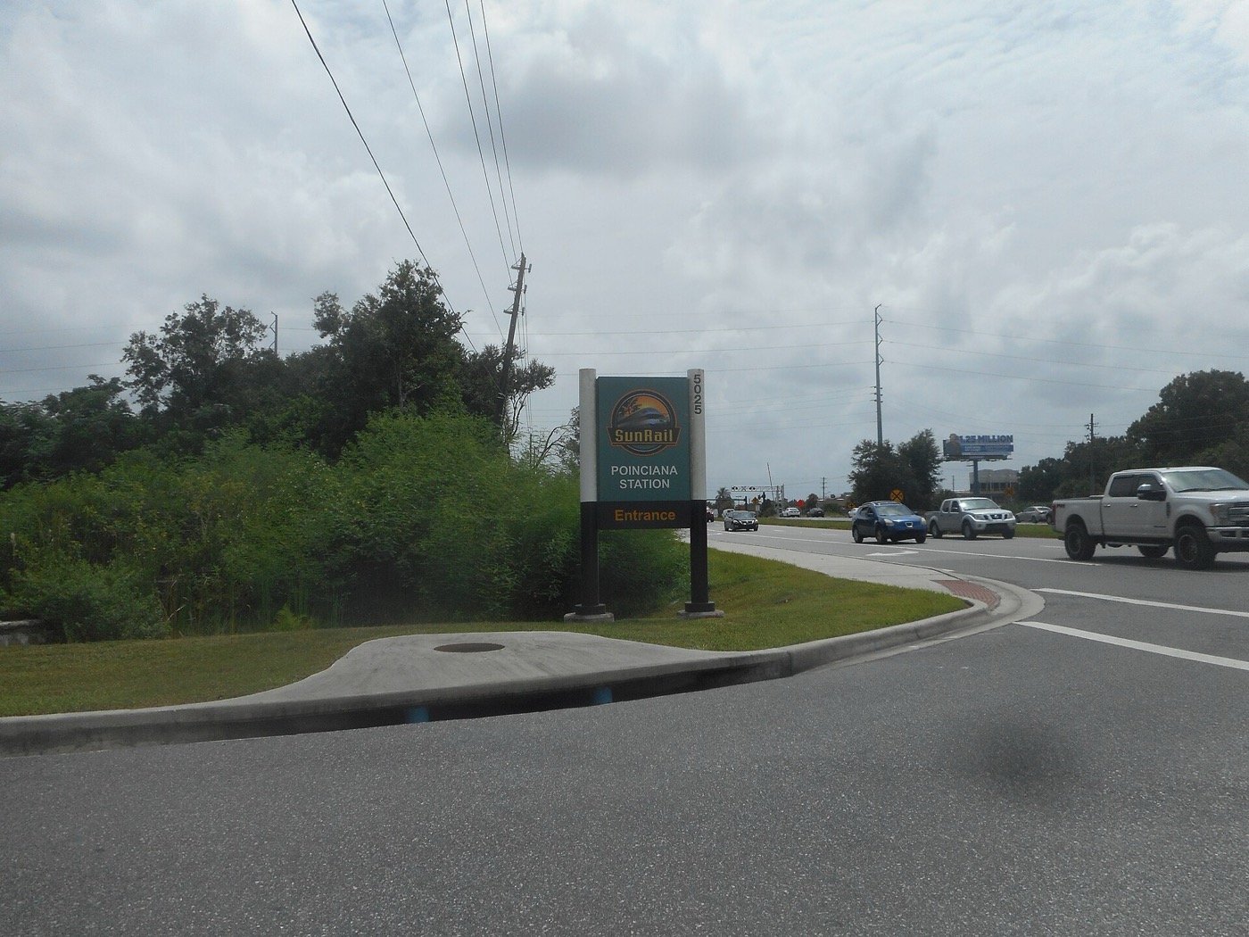 Entrance drive to the Poinciana SunRail station at South Poinciana Boulevard