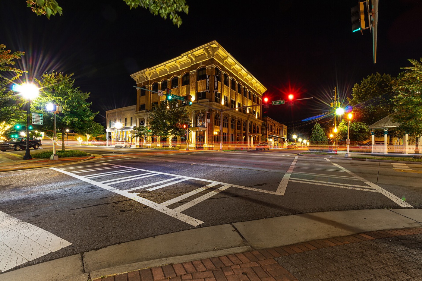 Downtown Winder storefronts lit up at night