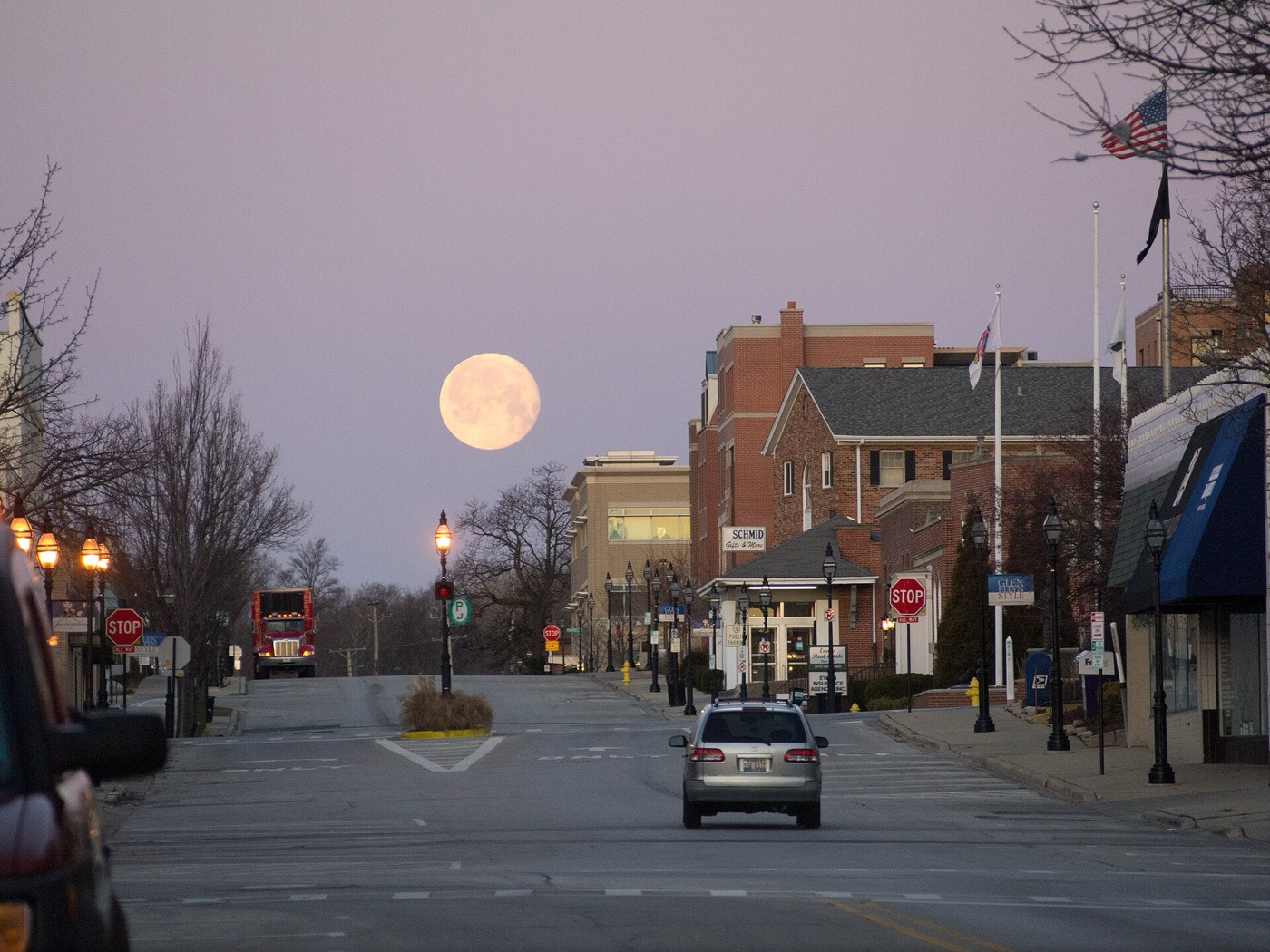 Downtown storefronts along Pennsylvania Avenue in Glen Ellyn, Illinois, looking west