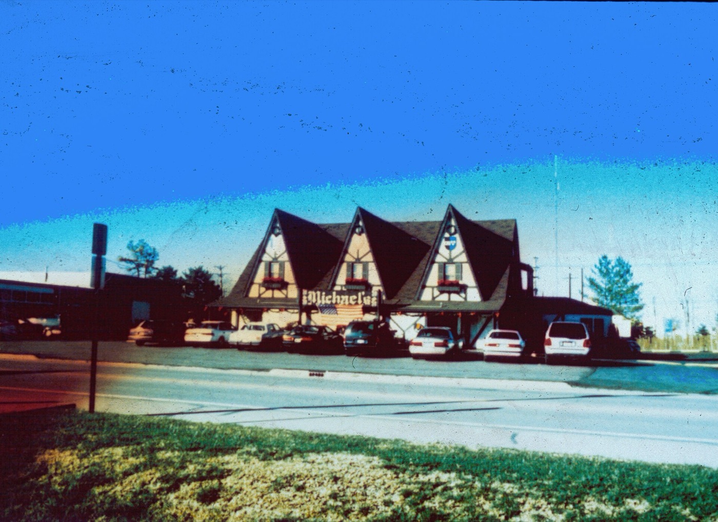 A building with a high peaked Swiss-style roof in Highland, Illinois