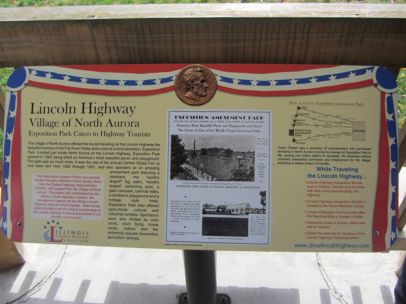 A Lincoln Highway marker monument in North Aurora