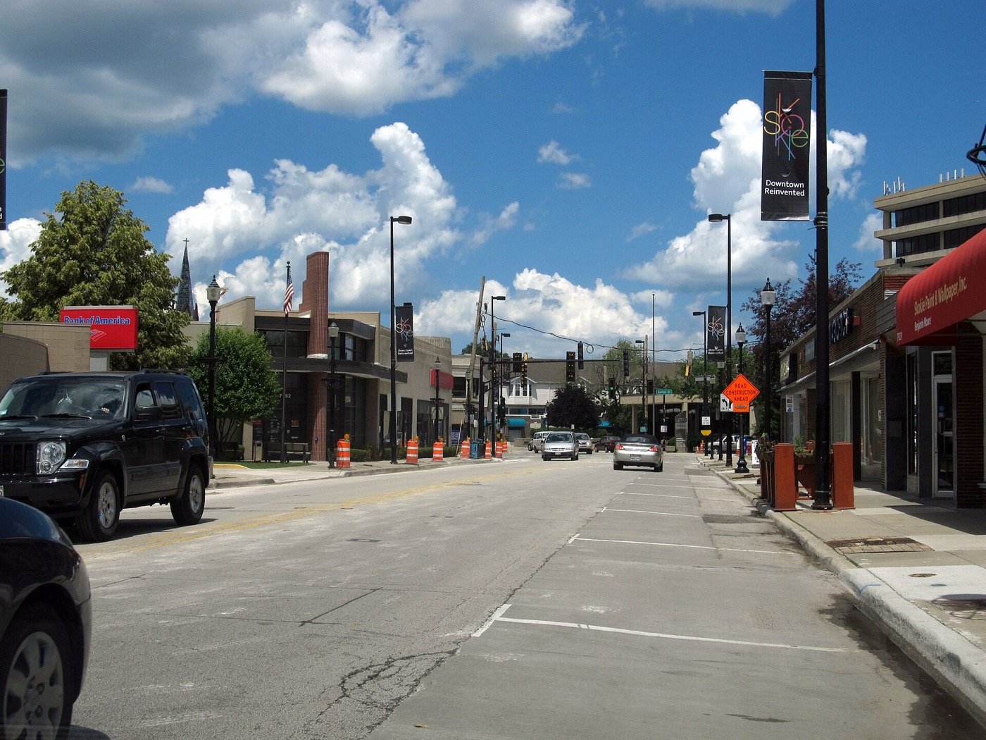 Shops and street lights along a street in downtown Skokie, Illinois