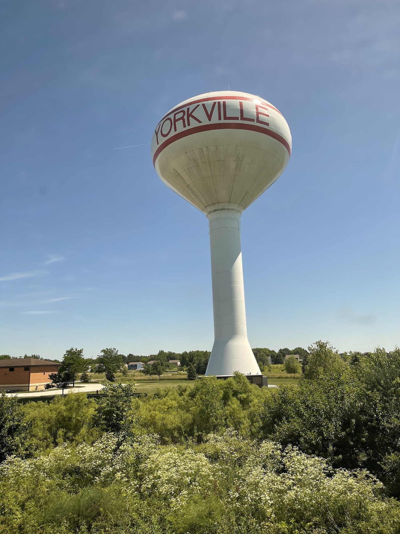 Yorkville's water tower seen from a passing train