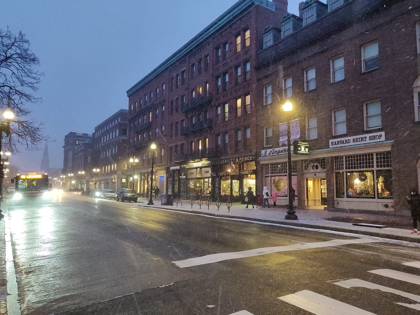 Harvard Square in Cambridge in winter, with shops and the square's buildings