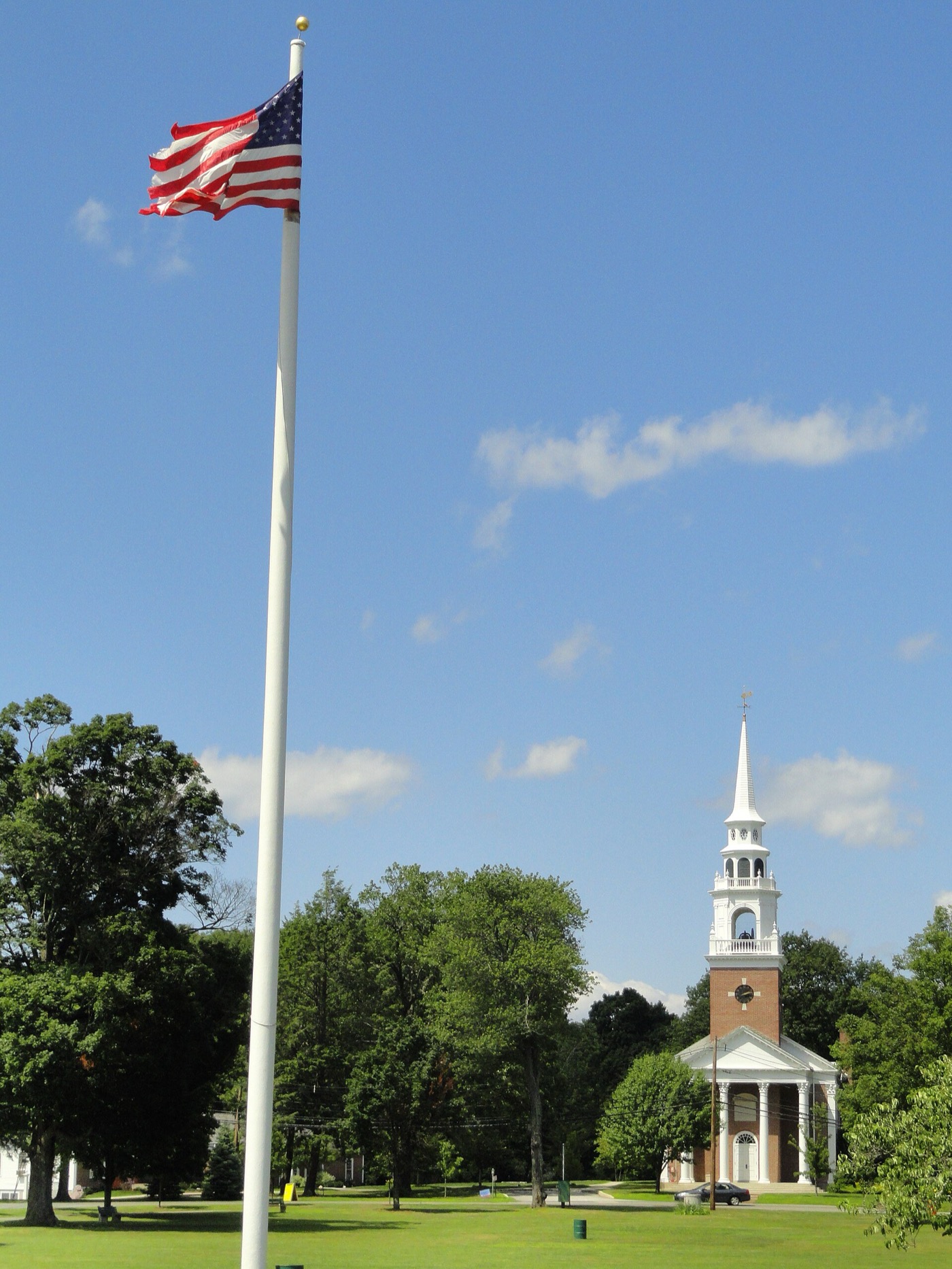 The common at Framingham Centre with trees and a historic building
