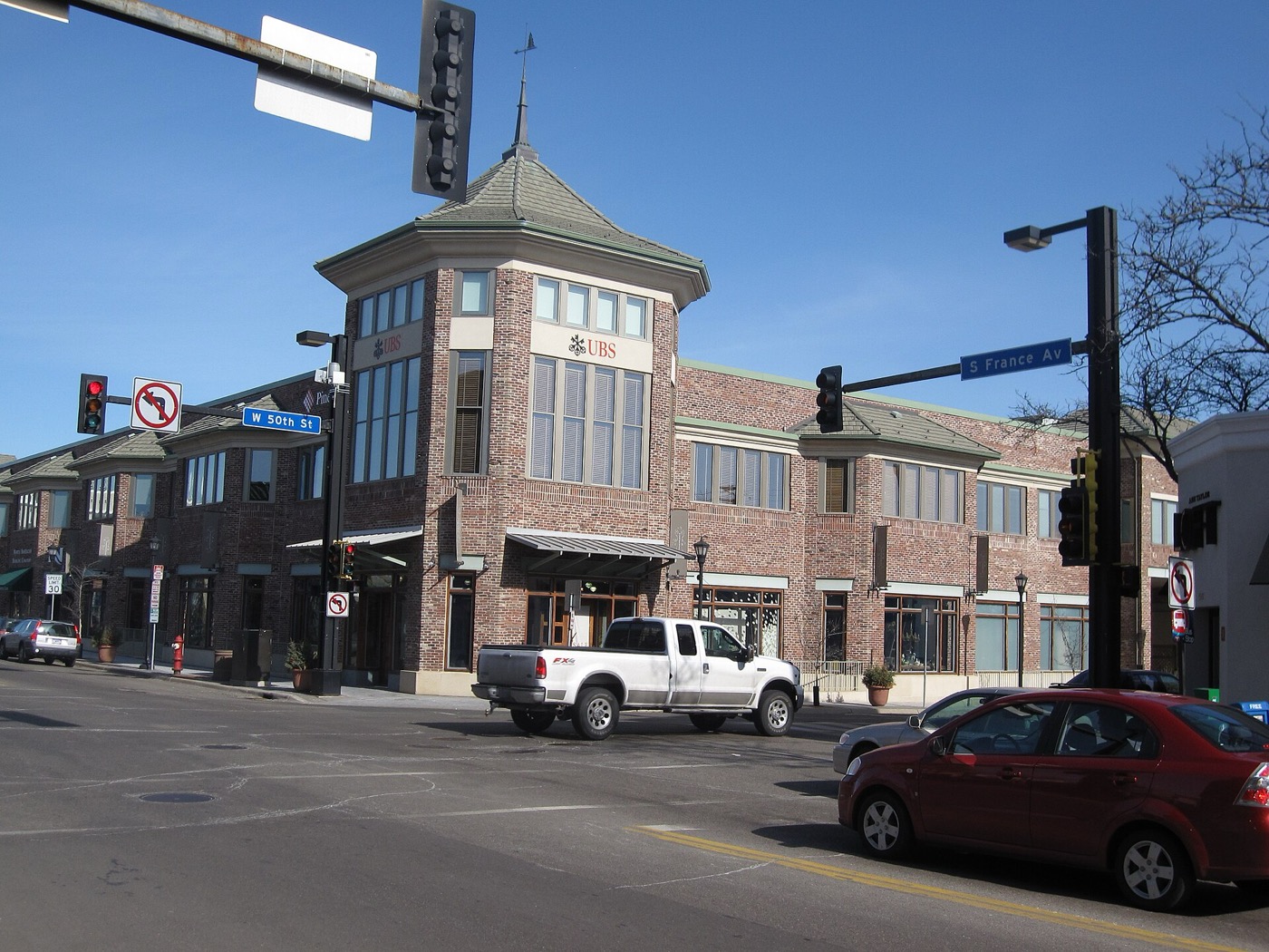 Brick corner building with a turret at the intersection of West 50th Street and France Avenue in Edina