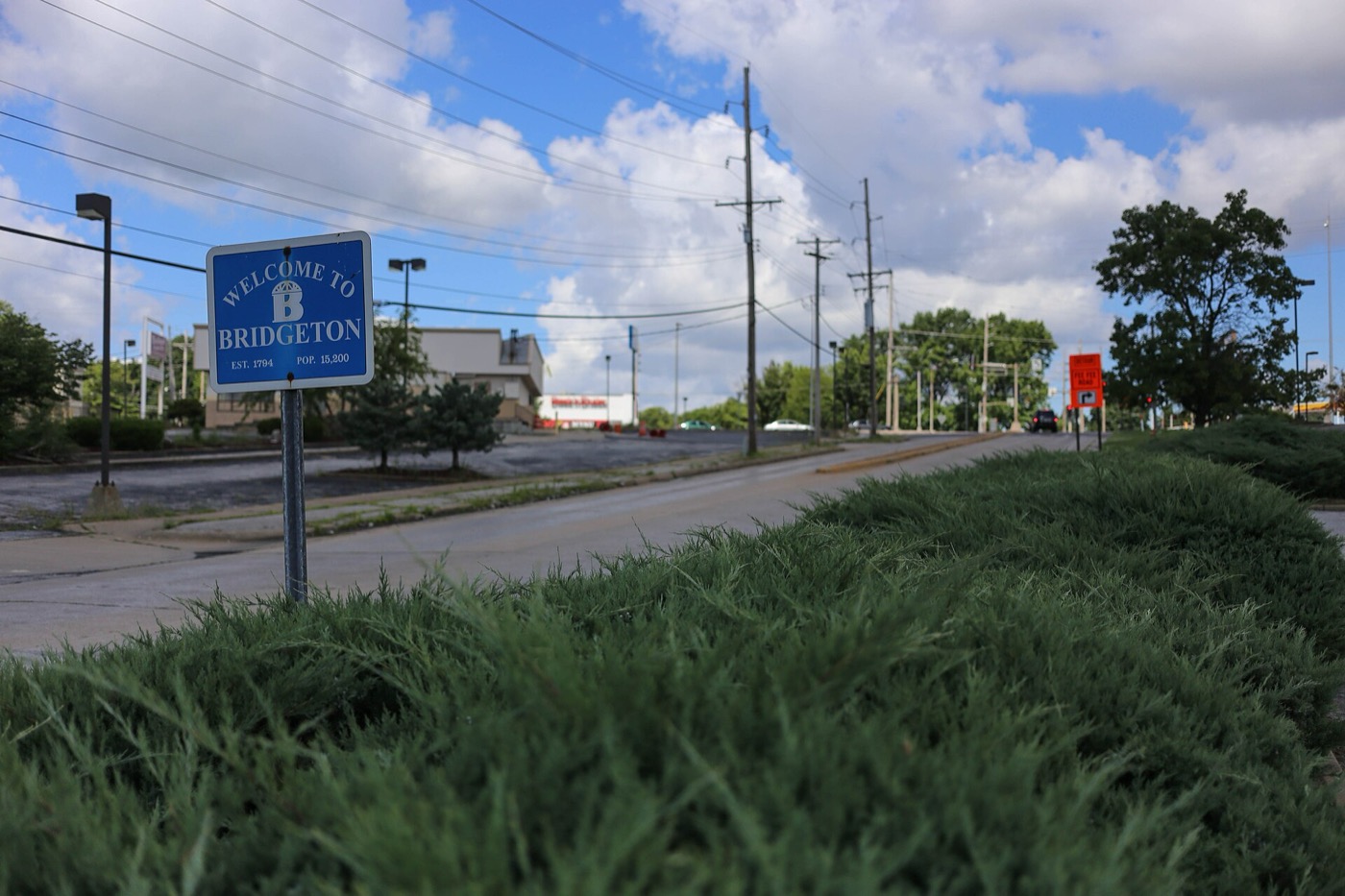 Welcome to Bridgeton sign beside a road and grass median in Bridgeton, Missouri