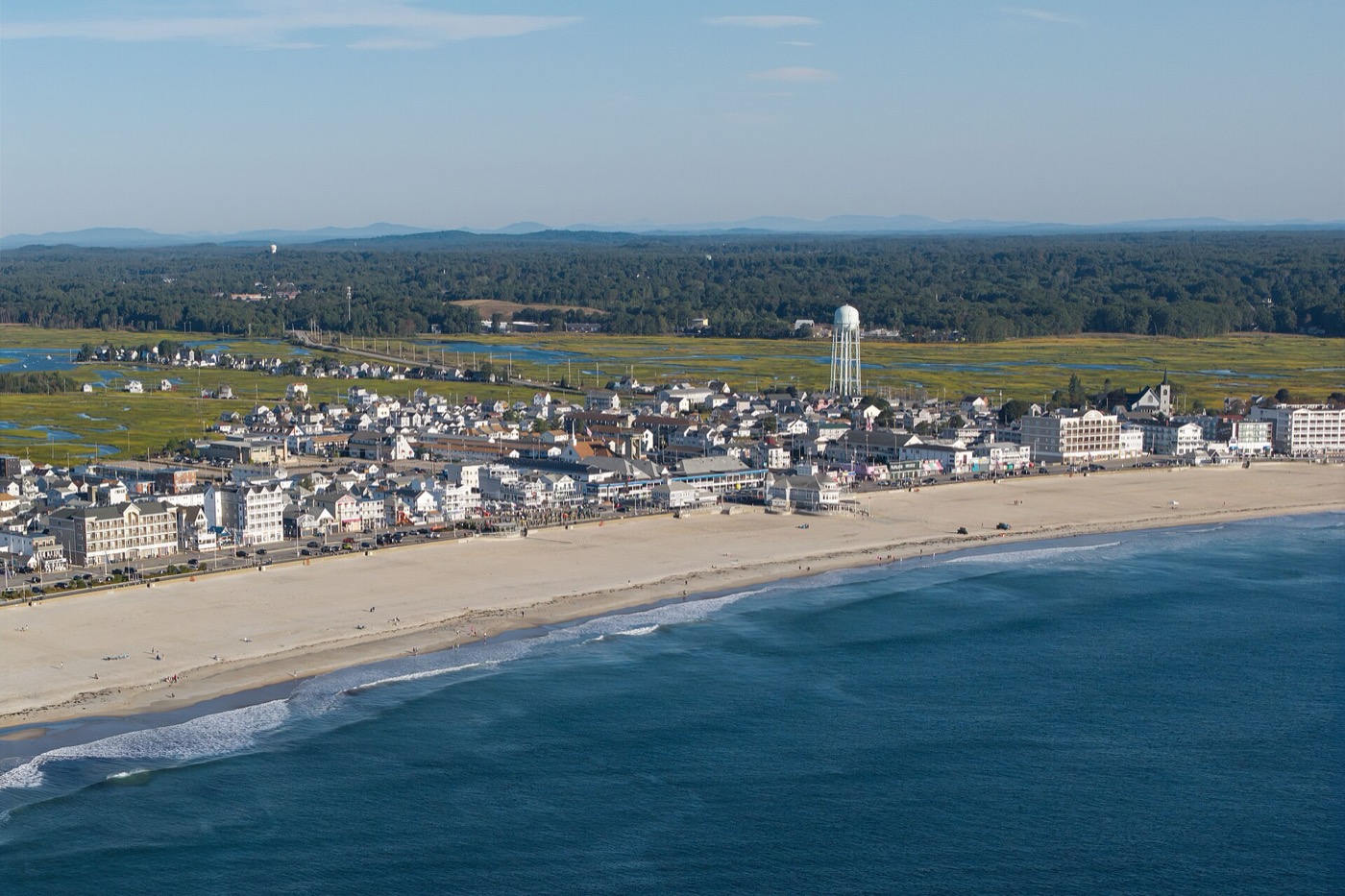 Aerial view of Hampton Beach with the boardwalk and shoreline
