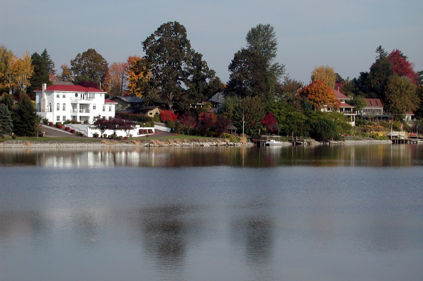 Fairview Lake with trees along the shore under a partly cloudy sky
