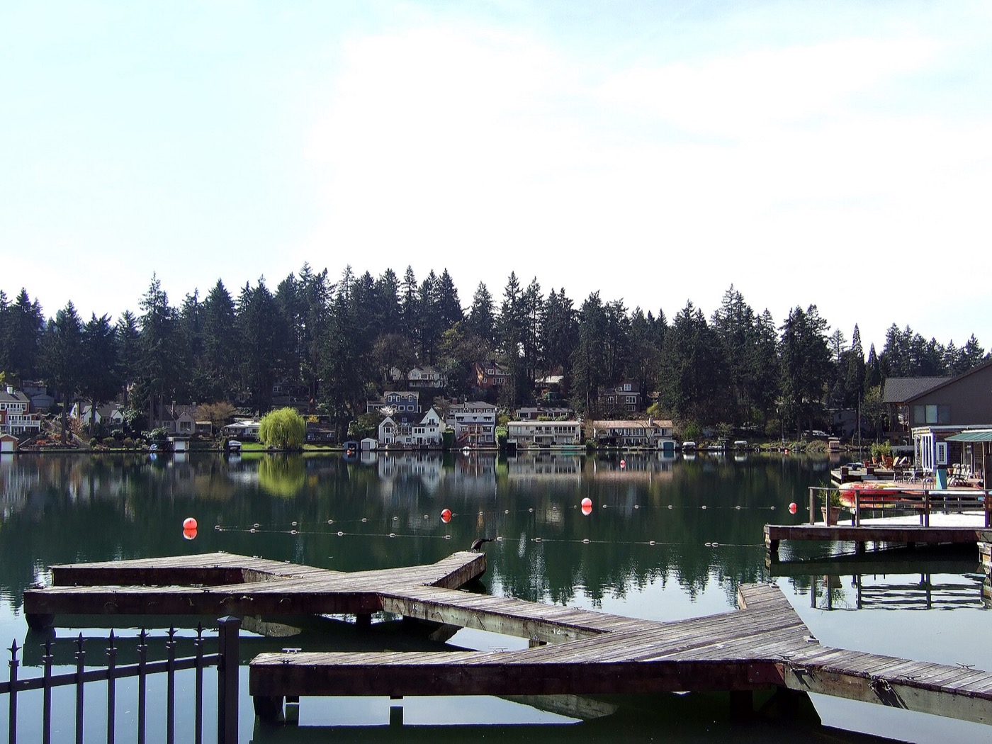Lakewood Bay on Oswego Lake surrounded by homes and trees