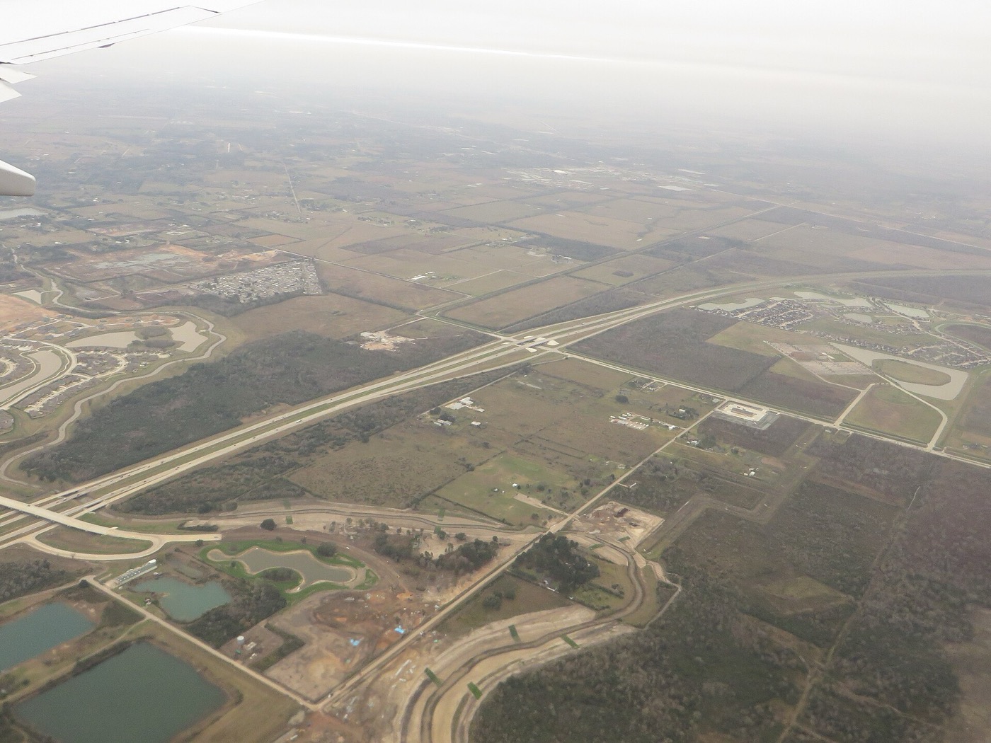 Aerial view of State Highway 288 and new subdivisions around Manvel, Texas