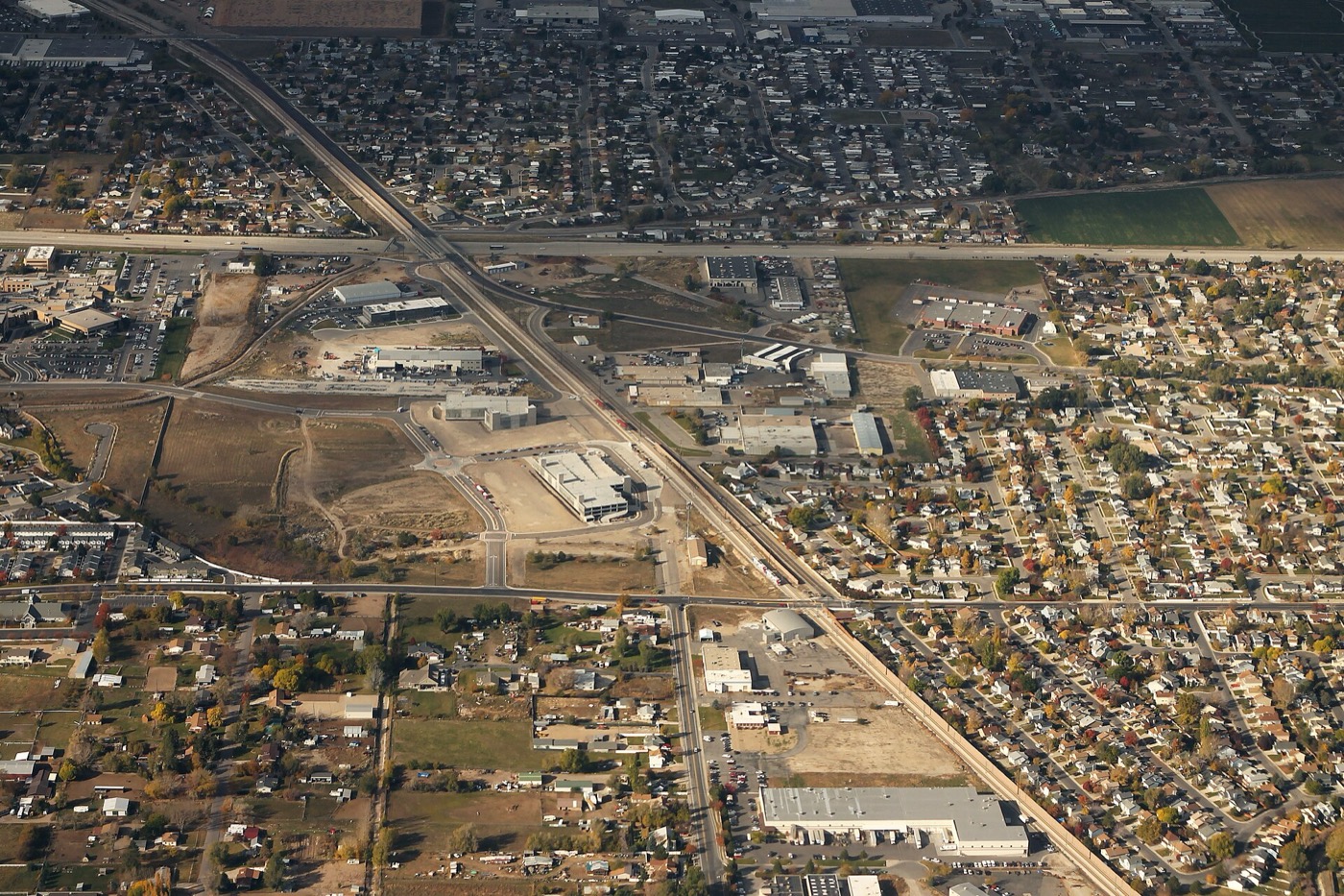 Aerial view of West Jordan neighborhoods and the TRAX light rail line