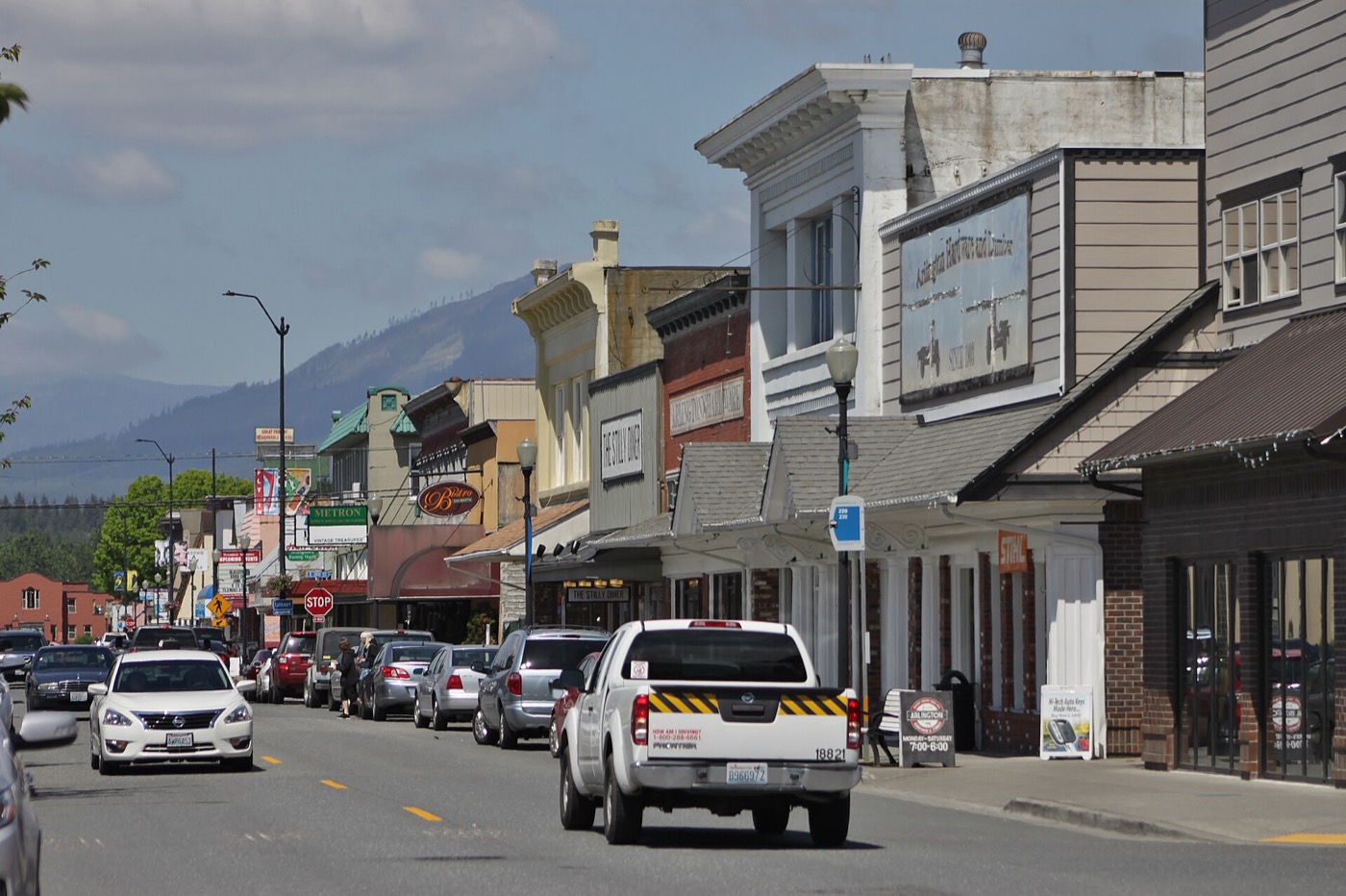 Looking north on Olympic Avenue in downtown Arlington, Washington, with storefronts on both sides