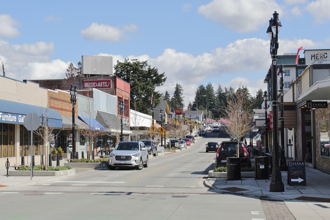 Shops and street trees along Main Street in downtown Bothell looking east from 101st Avenue