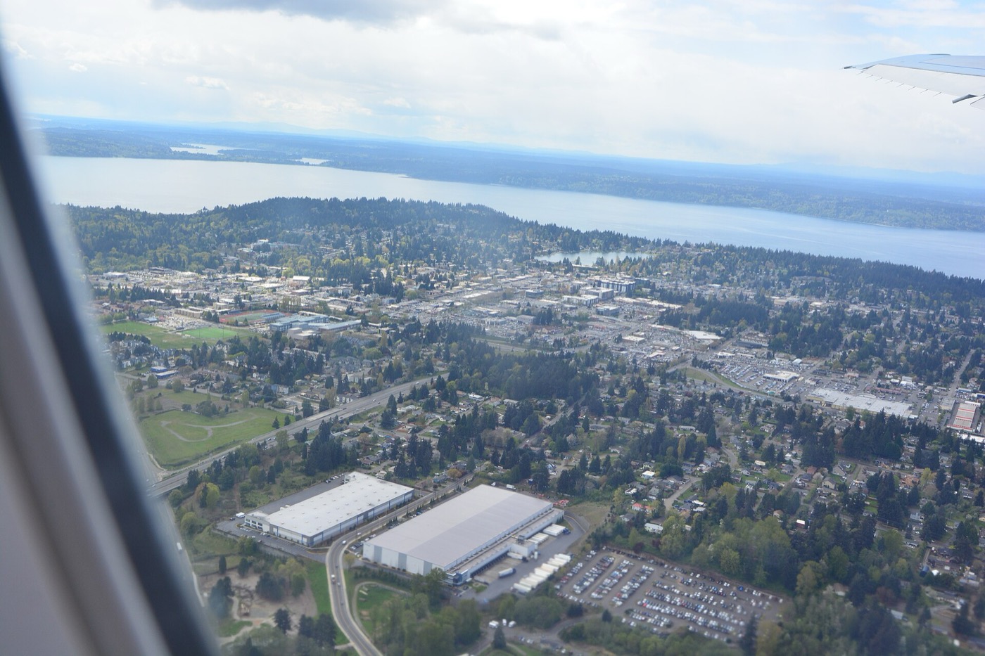 Aerial view from a plane over Burien's neighborhoods and State Route 509 toward Lake Burien and Puget Sound