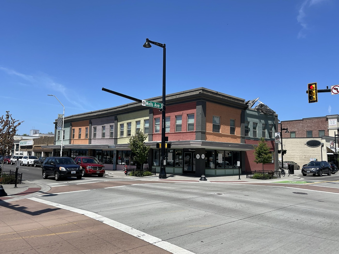 Two-story brick commercial buildings at a street corner in downtown Renton, Washington