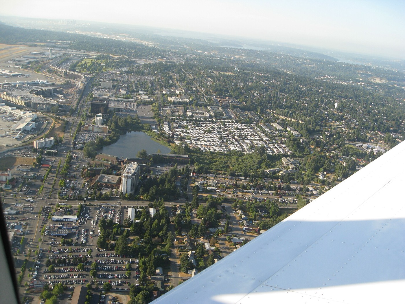 Aerial view of SeaTac with Angle Lake, neighborhoods and the airport area